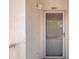 Condo entry with screen and solid front door at 1420 Water View W Dr # 203, Largo, FL 33771