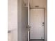 Condo entry with screen and solid front door at 1420 Water View W Dr # 203, Largo, FL 33771