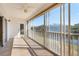 Spacious screened balcony with tranquil view at 1420 Water View W Dr # 203, Largo, FL 33771