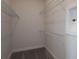 Bright walk-in closet with wire shelving for ample storage at 11216 Shoreline Trl, Parrish, FL 34219