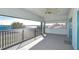 Screened balcony overlooking lake and landscape at 11521 Lake Lucaya Dr, Riverview, FL 33579