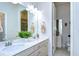 Bathroom with double vanity, and view of toilet area at 11521 Lake Lucaya Dr, Riverview, FL 33579