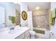 Clean bathroom with tub, shower, and updated vanity at 11521 Lake Lucaya Dr, Riverview, FL 33579
