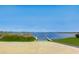 Lake access with wooden dock and ramp at 11521 Lake Lucaya Dr, Riverview, FL 33579