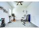Bright home gym with various exercise equipment at 11521 Lake Lucaya Dr, Riverview, FL 33579