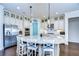 Spacious kitchen with granite island, stainless steel appliances, and white shaker cabinets at 11521 Lake Lucaya Dr, Riverview, FL 33579