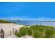 Sandy beach access with stairs and railing at 11521 Lake Lucaya Dr, Riverview, FL 33579