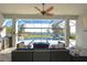 Outdoor oasis with a pool, patio furniture, and kitchen at 11521 Lake Lucaya Dr, Riverview, FL 33579