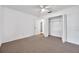 Bedroom featuring a ceiling fan and closet at 1606 Berwick Ct # 10B, Palm Harbor, FL 34684