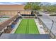 Aerial view of bocce ball court featuring manicured lawns and benches for relaxing during matches at 1606 Berwick Ct # 10B, Palm Harbor, FL 34684