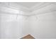 Walk-in closet with ample shelving at 1606 Berwick Ct # 10B, Palm Harbor, FL 34684