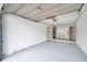 A bright garage provides ample space and a functional layout, with extra space beyond utility area at 1606 Berwick Ct # 10B, Palm Harbor, FL 34684