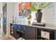 Modern console table with artwork and decorative accents at 111 N 12Th St # 1306, Tampa, FL 33602