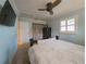 Bedroom with full-size bed, TV and closet at 119 Irwin, Safety Harbor, FL 34695