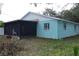 Exterior view of a light blue house with screened porch at 119 Irwin, Safety Harbor, FL 34695