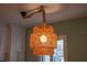 Stylish woven pendant light fixture hanging over kitchen island at 119 Irwin, Safety Harbor, FL 34695