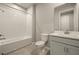 Clean bathroom with bathtub, toilet and vanity at 12355 Hearts Ease St, Venice, FL 34293