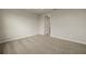 Bright bedroom with neutral walls and carpet at 12355 Hearts Ease St, Venice, FL 34293