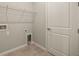 Functional laundry room with washer and dryer hookups at 12355 Hearts Ease St, Venice, FL 34293