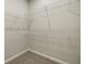 Spacious walk-in closet with wire shelving at 12355 Hearts Ease St, Venice, FL 34293