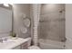 Bathroom with shower/tub combo, vanity, and updated fixtures at 13813 Sharp Hawk Dr, Riverview, FL 33569