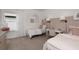 Bedroom with two twin beds, desks, and soft decor at 13813 Sharp Hawk Dr, Riverview, FL 33569