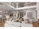 Open living room with high ceilings and a view of the kitchen at 13813 Sharp Hawk Dr, Riverview, FL 33569