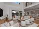 Spacious living area with open floor plan and access to the pool at 13813 Sharp Hawk Dr, Riverview, FL 33569