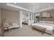 Spacious main bedroom suite with sitting area and large windows at 13813 Sharp Hawk Dr, Riverview, FL 33569