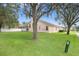 Nice backyard with large tree and grassy area at 2813 Norwood Hills Ln, Valrico, FL 33596