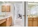 Double vanity bathroom with access to gym at 2813 Norwood Hills Ln, Valrico, FL 33596
