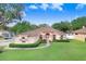 Beautiful one-story home with a well-manicured lawn at 2813 Norwood Hills Ln, Valrico, FL 33596