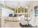 Bright and spacious Gathering room, featuring a cozy seating area and a large window at 2813 Norwood Hills Ln, Valrico, FL 33596