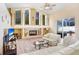 Spacious living room with a fireplace and lots of natural light at 2813 Norwood Hills Ln, Valrico, FL 33596