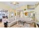 Open living space with light colored furniture and access to a patio at 2813 Norwood Hills Ln, Valrico, FL 33596