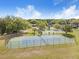 Well-maintained tennis court in a green space at 2813 Norwood Hills Ln, Valrico, FL 33596