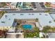 Overhead view of building and surrounding area, including pool at 600 71St Ave # 17, St Pete Beach, FL 33706