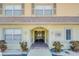 Attractive building entryway with a brick-paved walkway at 600 71St Ave # 17, St Pete Beach, FL 33706
