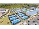 Aerial view of community pickleball and tennis courts at 10864 Banyan Breeze Blvd, Land O Lakes, FL 34638