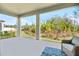 Spacious covered patio overlooking the backyard at 10864 Banyan Breeze Blvd, Land O Lakes, FL 34638
