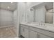 Double vanity bathroom with walk-in shower at 12310 Hearts Ease St, Venice, FL 34293