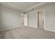 Primary bedroom with carpet and access to bathroom at 12310 Hearts Ease St, Venice, FL 34293