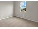 Bright bedroom with carpet and window at 12310 Hearts Ease St, Venice, FL 34293