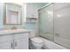 Well-maintained bathroom with tub shower combo and white vanity at 1435 Millstream Ln # 202, Dunedin, FL 34698