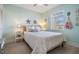 Bright bedroom with a double bed and coastal decor at 1435 Millstream Ln # 202, Dunedin, FL 34698
