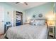 Cozy bedroom featuring a comfortable double bed and built-in closet at 1435 Millstream Ln # 202, Dunedin, FL 34698