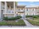 Two-story building with private entrance and landscaping at 1435 Millstream Ln # 202, Dunedin, FL 34698
