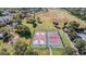 Community park featuring basketball and tennis courts near playground at 1435 Millstream Ln # 202, Dunedin, FL 34698