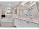Primary bathroom with a large corner soaking tub and double vanity at 1510 Mahogany Ln # 606, Palm Harbor, FL 34683