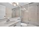 Clean bathroom with shower/tub combo and updated vanity at 1510 Mahogany Ln # 606, Palm Harbor, FL 34683